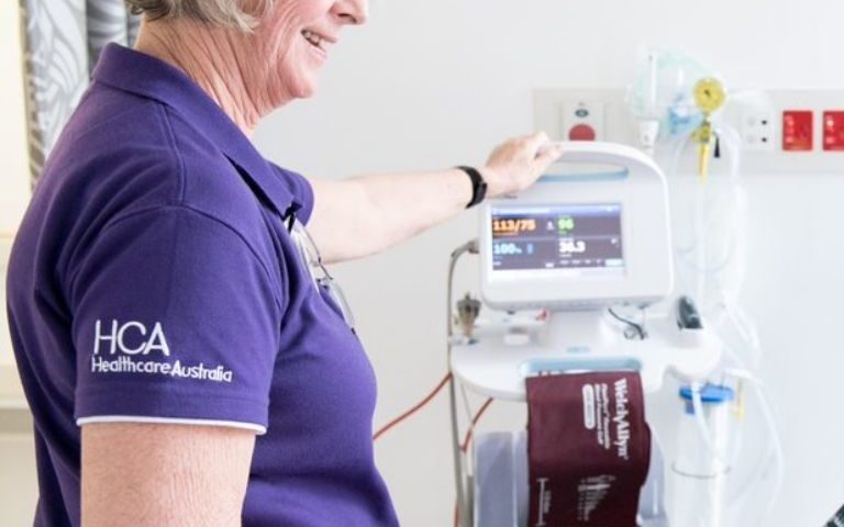 Healthcare Australia NDIS Concierge Nurse Assisting a Patient